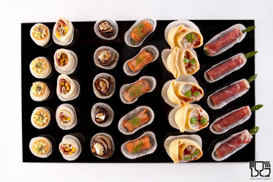 A platter of cocktail snacks in paper liners, 30 pieces STANDARD